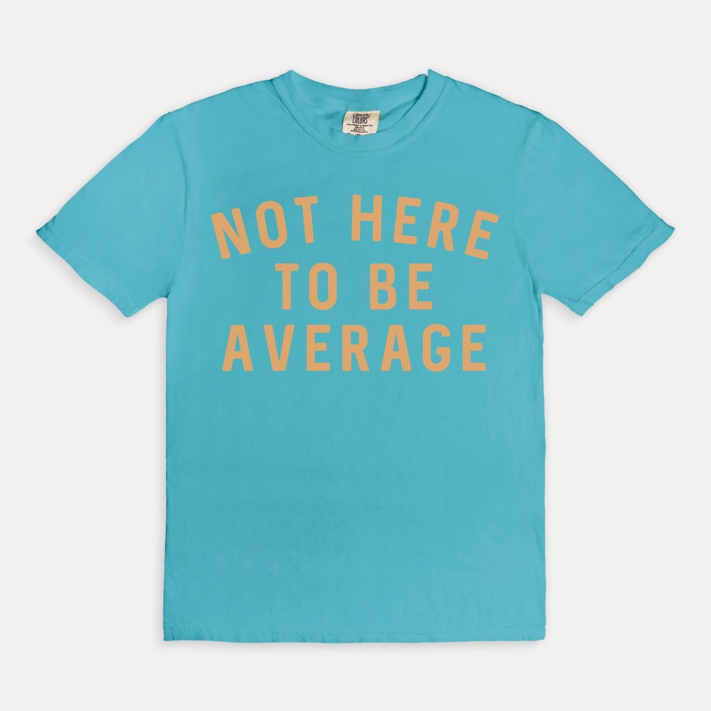 Shop the Not Here To Be Average T-Shirt in Lagoon. Free shipping. Buy today at Up & Comer!