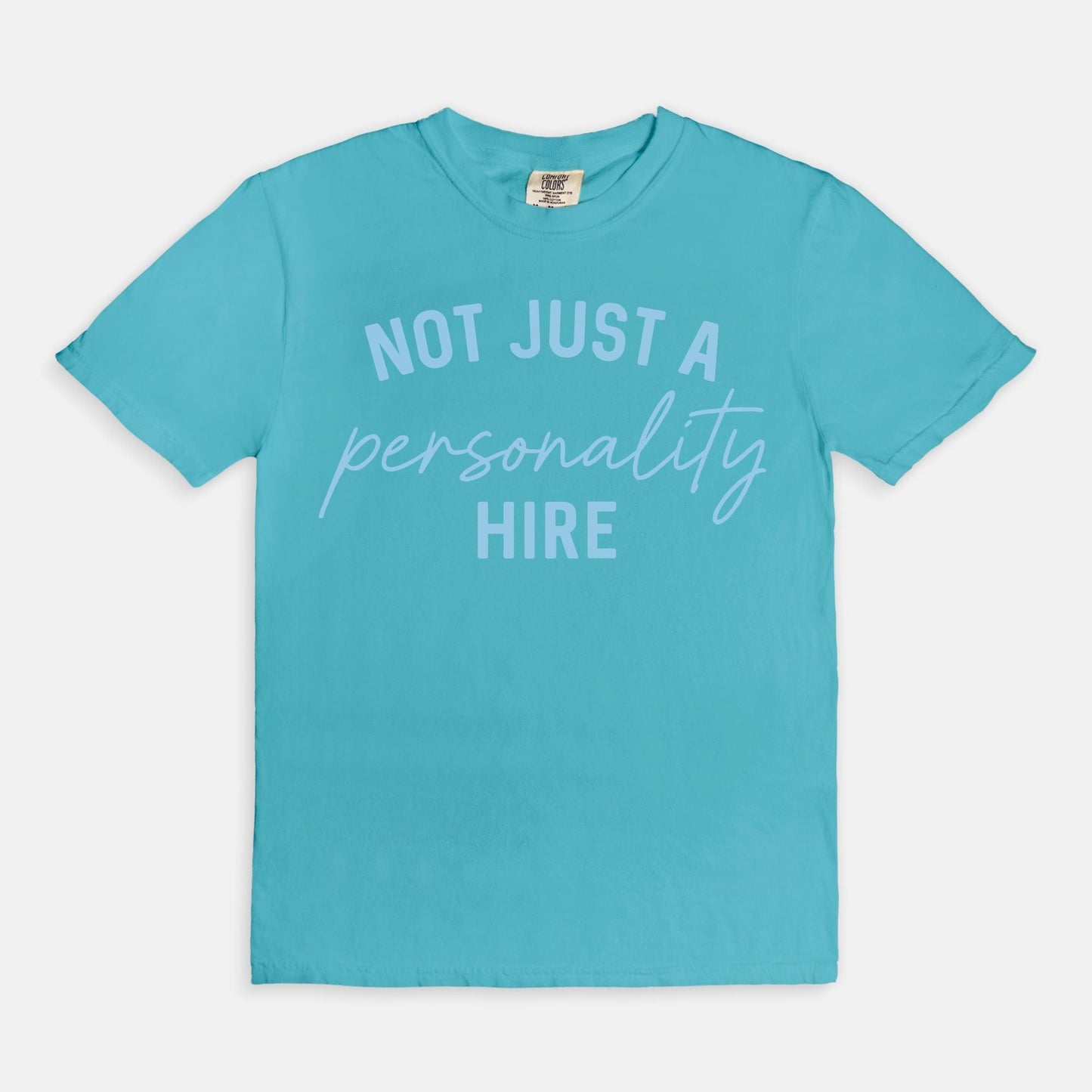 Shop the Not Just A Personality Hire T-Shirt in Lagoon. Free shipping. Buy today at Up & Comer!