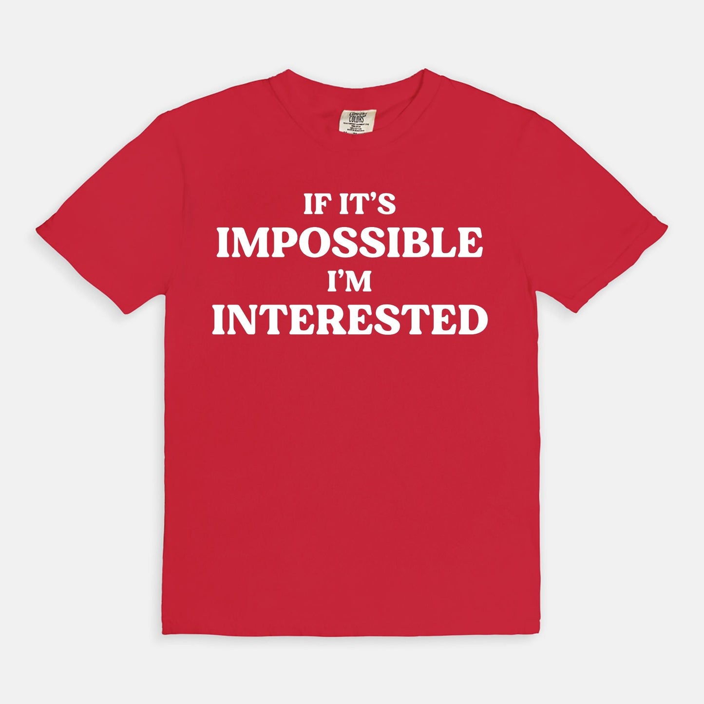 Shop the If It's Impossible I'm Interested T-Shirts at Up & Comer. Free shipping!
