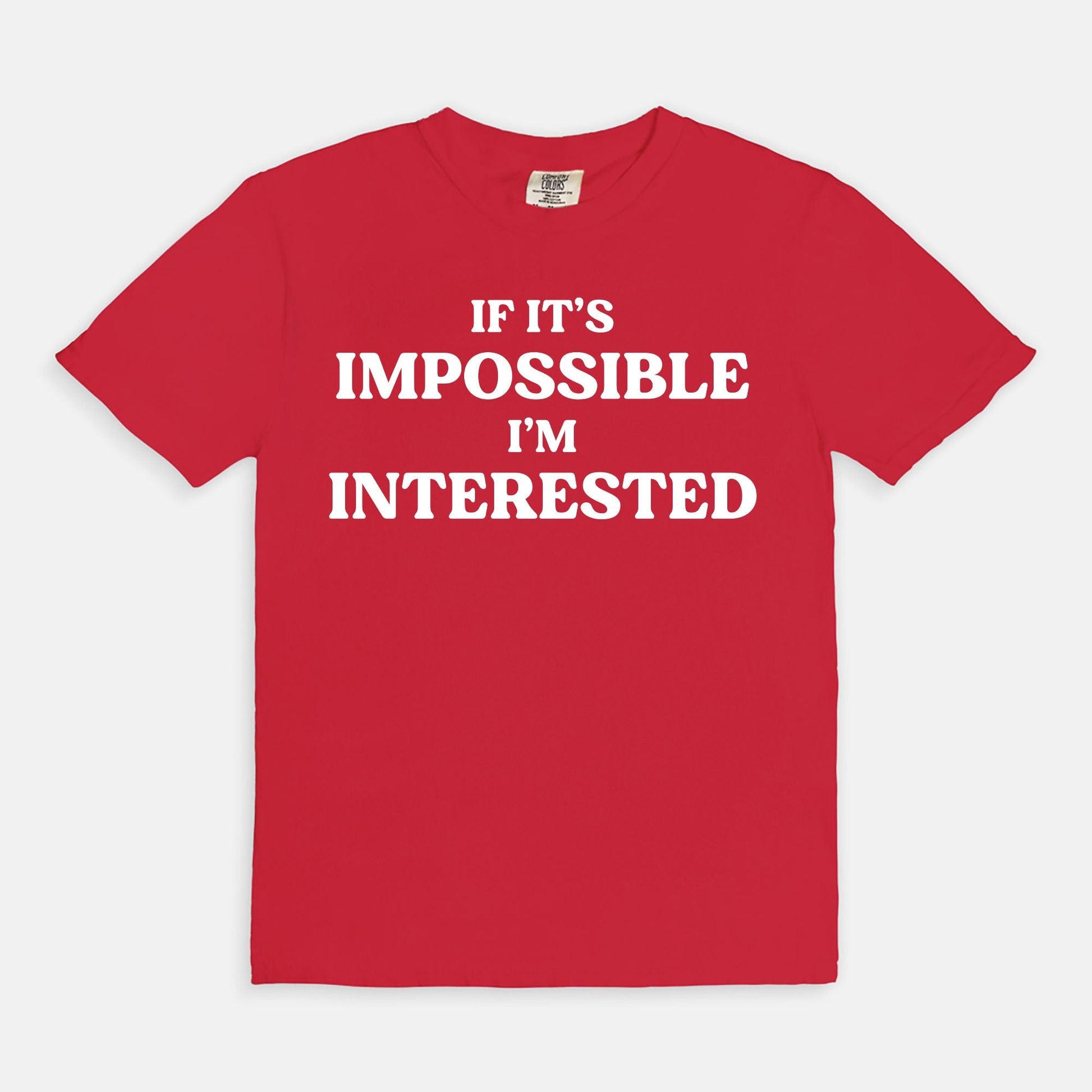 Shop the If It's Impossible I'm Interested T-Shirts at Up & Comer. Free shipping!