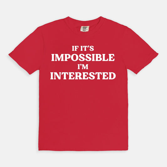 Shop the If It's Impossible I'm Interested T-Shirts at Up & Comer. Free shipping!