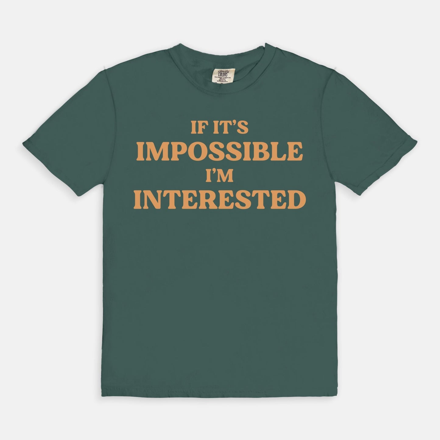 Shop the If It's Impossible I'm Interested T-Shirts at Up & Comer. Free shipping!
