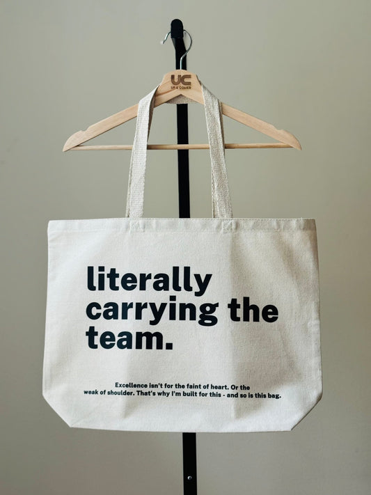 Shop the Literally Carrying the Team Tote Bags at Up & Comer. Free shipping!